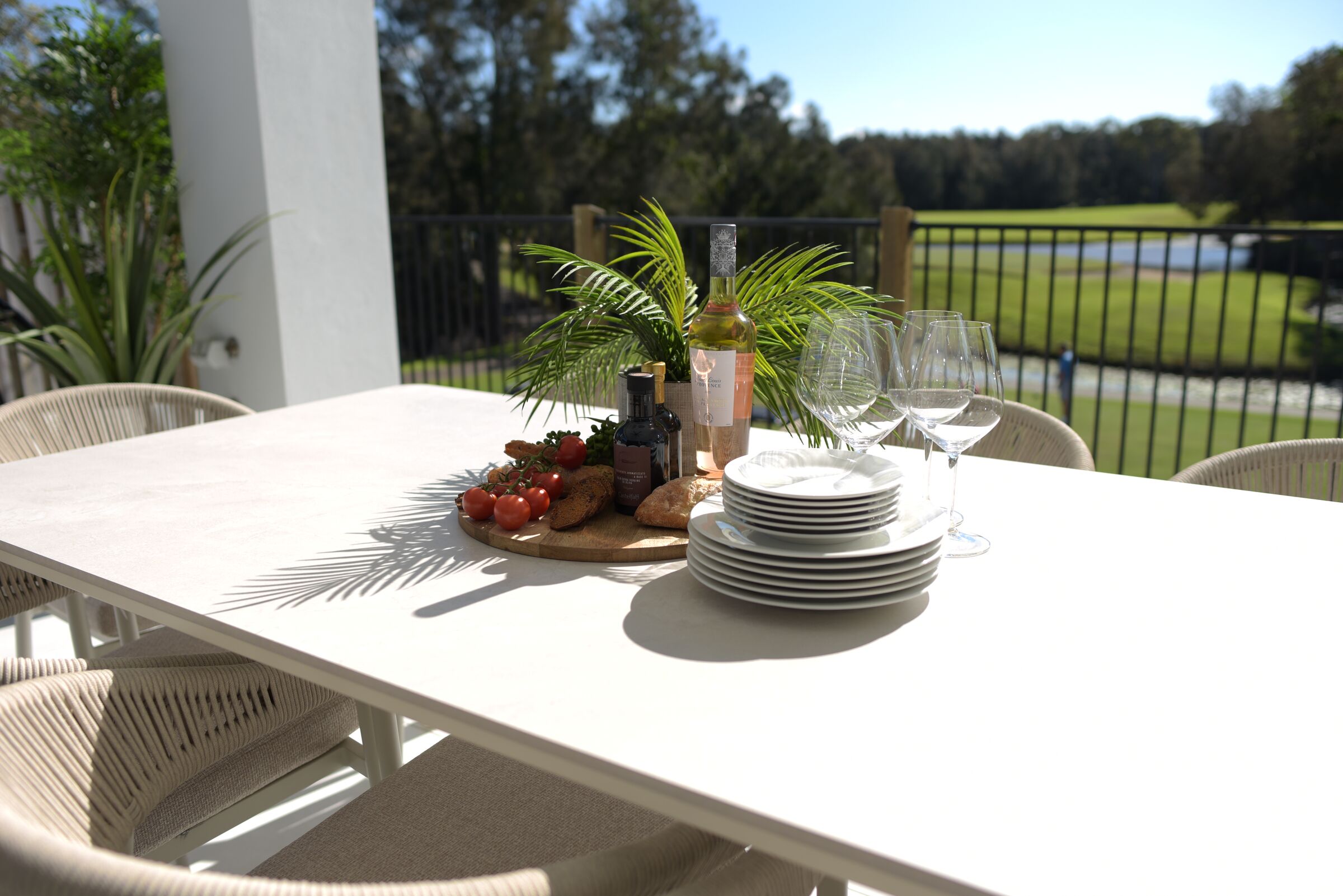 Kiara Rope York outdoor dining setting on a sunny alfresco deck overlooking a golf course